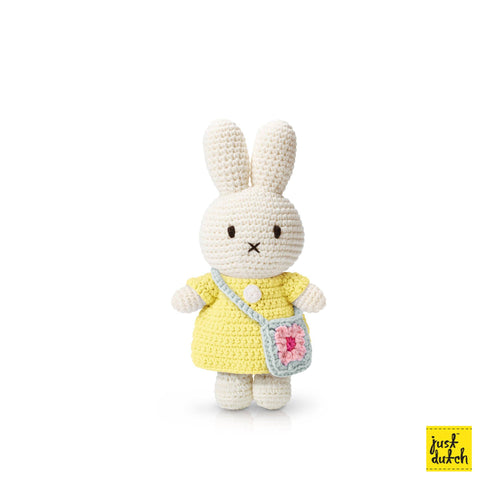 Miffy and her flower bag: Pastel yellow dress with blue flower bag
