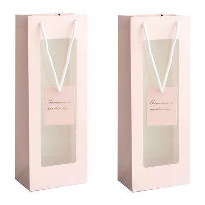 HANSWARE 2PCS Wine Gift Bag Clear Window Wine Bags for Wine Bottles Gifts Paper Bottle Gift Bags with Handles for ValentinesWeddingEasterChristmasBaby ShowerBirthday PartyPink