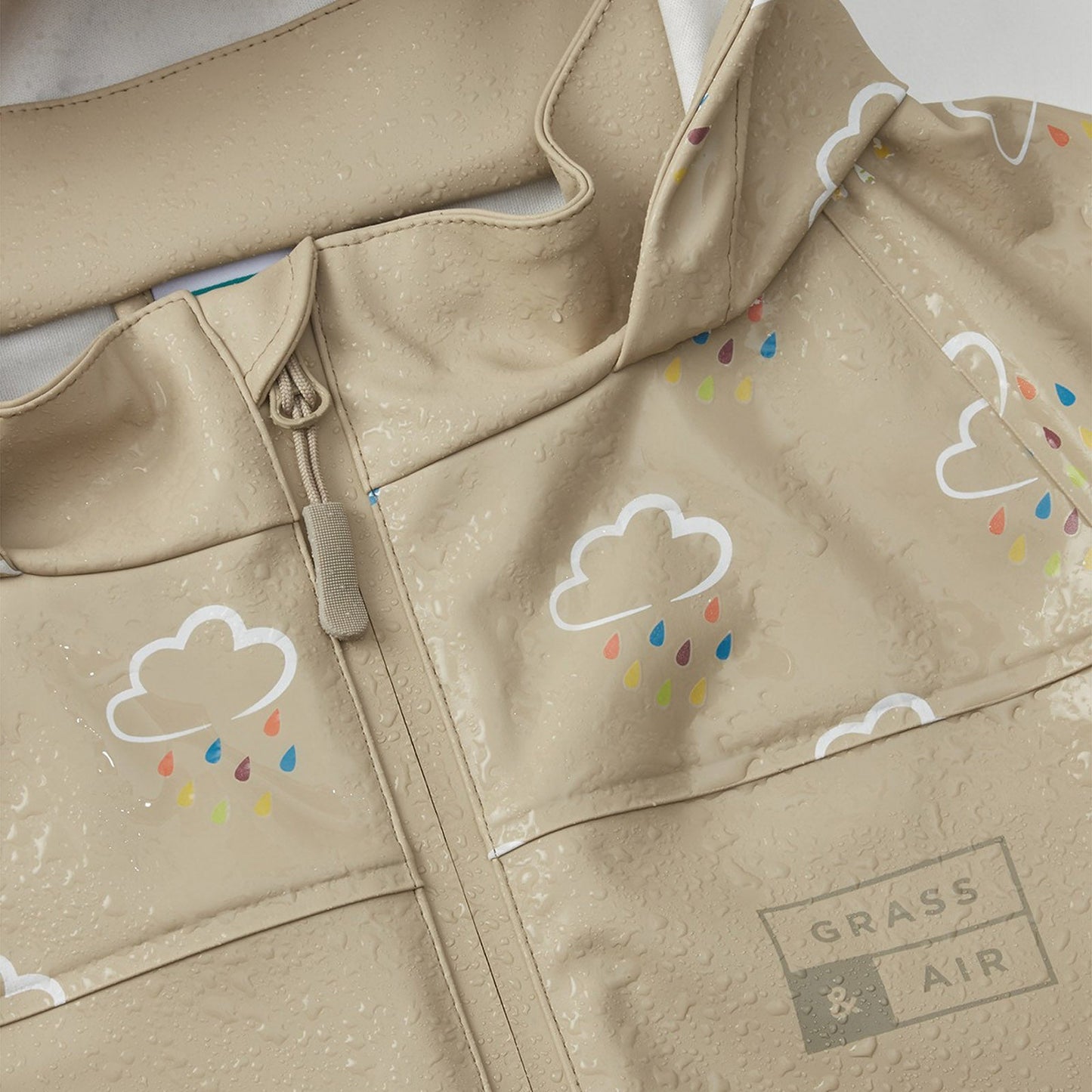 Grass and Air Colour Changing Rain Jacket - Stone
